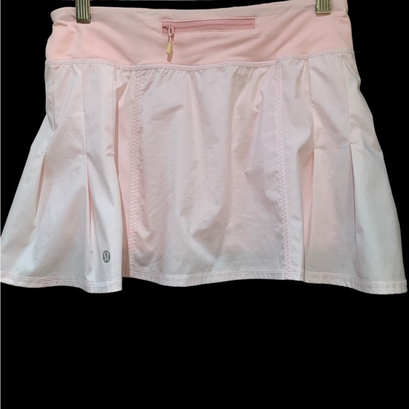 Lululemon skort Worn once. Color is peach not orange. Super cute for summer ! - Picture 2 of 7